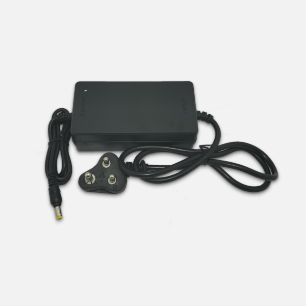 12V 2A Adapter UPS product view showing power cable, DC output connector, and compact cabinet enclosure.