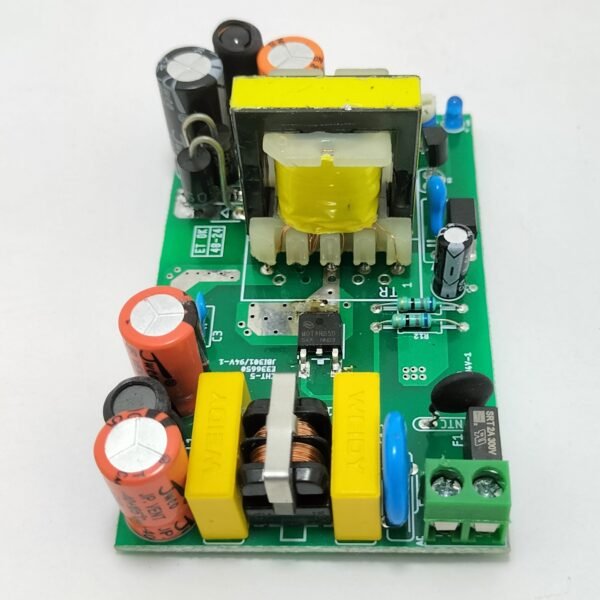 Top view SMPS power supply PCB board with transformer EMI filter capacitors and power regulation components