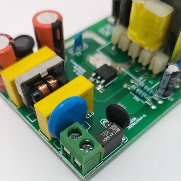 SMPS PCB input section close up showing EMI filter choke surge protection and AC input terminal